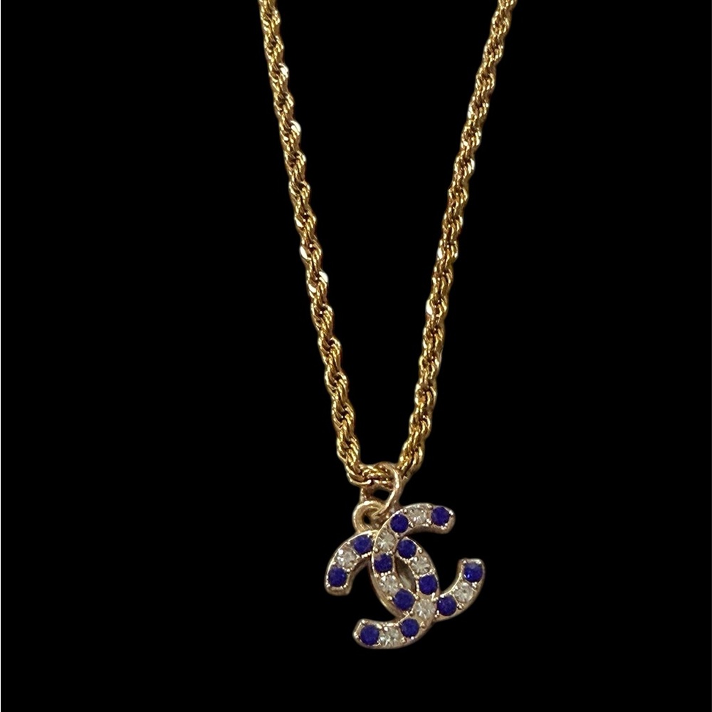 CHANEL EUC double C gold tone 
blue & clear rhinestone 
18” titanium gold rope